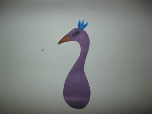 Fabuloso pavo real hecho de papel de colores
