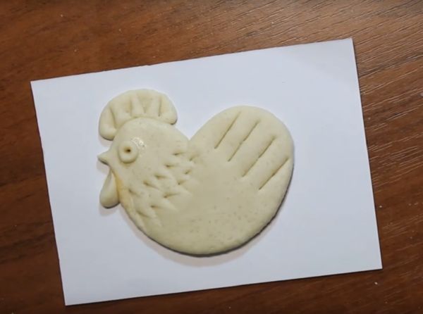 Gallo con sus propias manos
