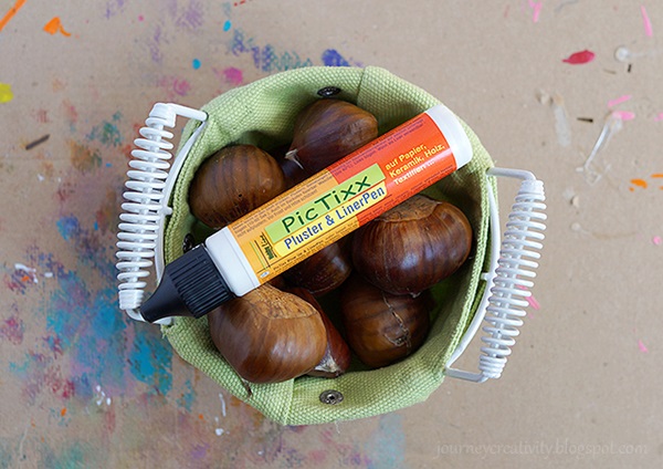 Artesanía de castañas sobre el tema de otoño