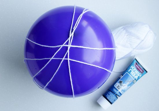 Bola de lámpara con tus manos
