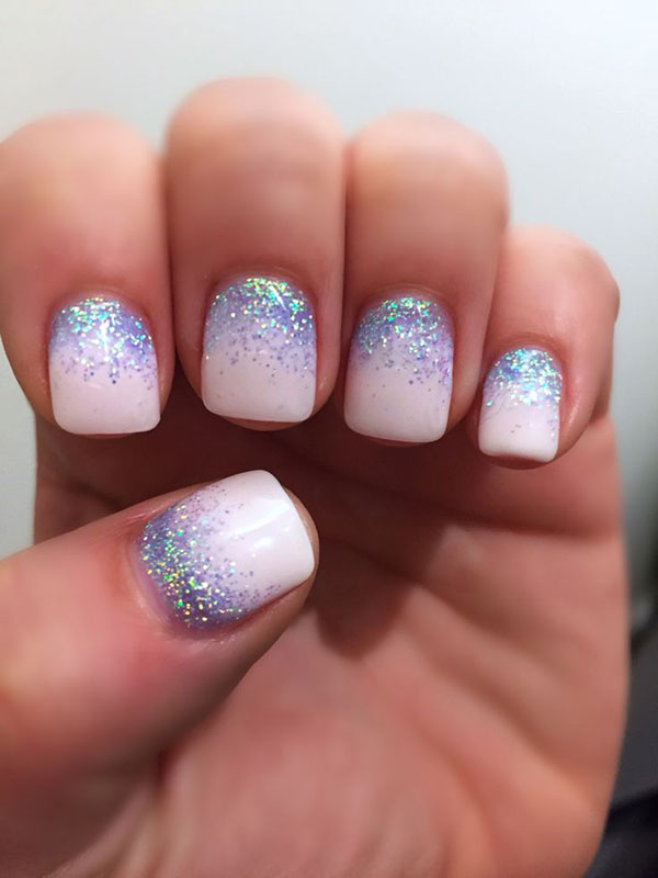 Glitter y piedras Swarovski como una tendencia de la manicura de invierno 2016-2017