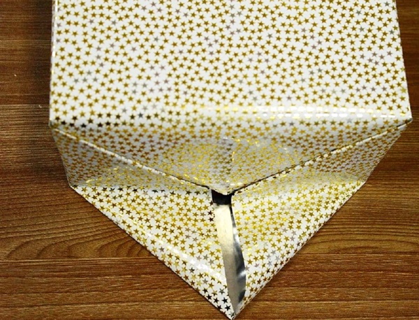 Cómo empacar un regalo en un papel de regalo