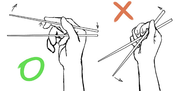 Cómo sostener palos para sushi