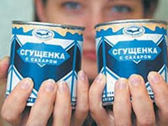 Cómo cocinar leche condensada en una lata?
