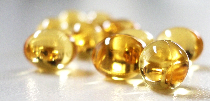 Vitamina E en cápsulas faciales y capilares